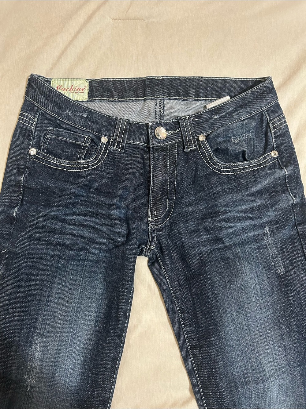 Vintage Machine Nouvelle Mode flared low-mid rise dark wash jeans
